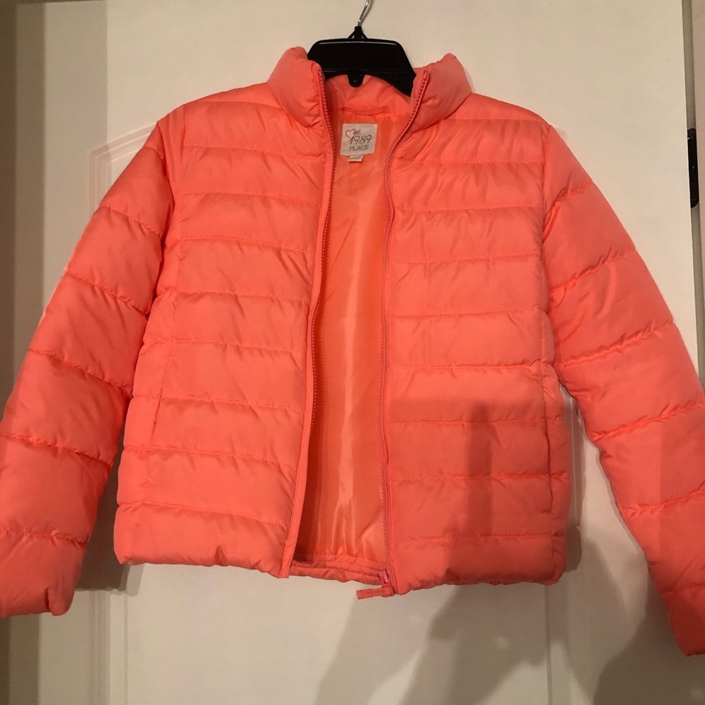 Brand new girls puffer coat in a beautiful coral.